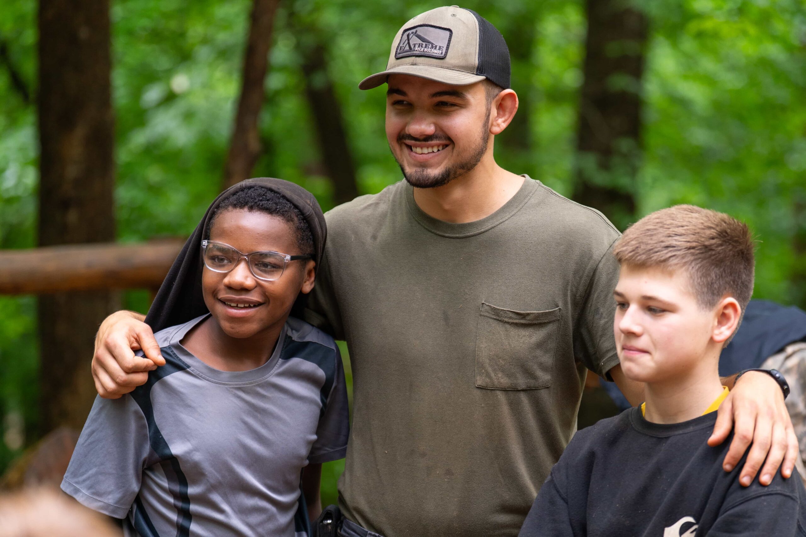 Fair Play Chief with two campers in the woods